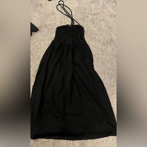 Black tube dress with tie.